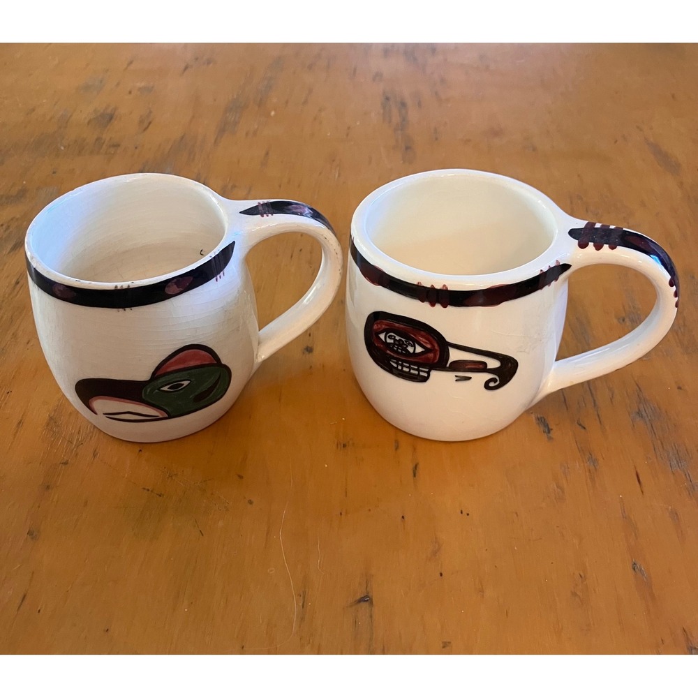 2 Lambert Potteries Skookum Mugs Cream Native First Nations Art Mosquito Skookum